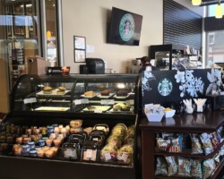 The inside of the market, showcasing fresh ready-to-go food items. The inside of the market, showcasing fresh food.