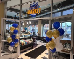 The entrance to the market, showcasing the decor inside. The entrance to the market, showcasing the decor inside.